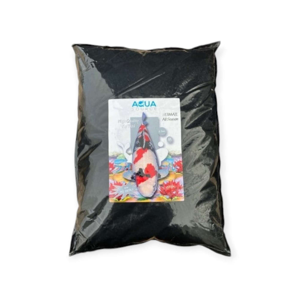 Aquasource Ultimate All Season feeding koi in clear pond water