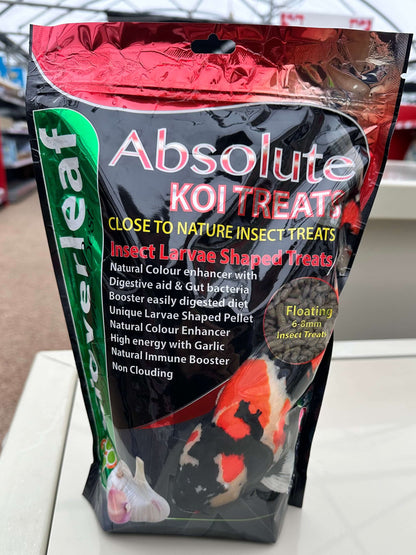 Cloverleaf Koi Treats Insect Larvae Garlic packaging showcasing high-protein floating pellets for koi and pond fish.